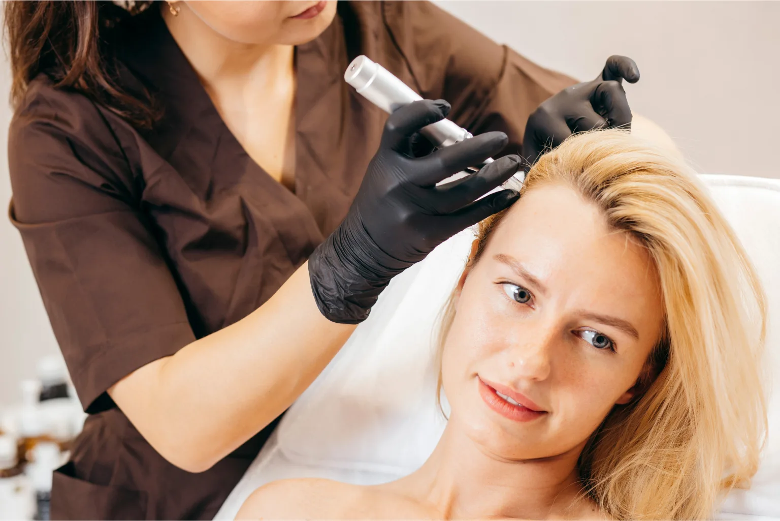 Scalp treatment using advanced tools for hair restoration.