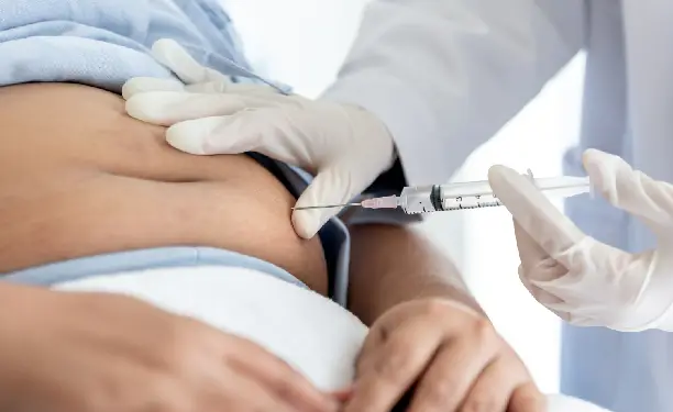 Close-up of a mesotherapy fat melting injection procedure for targeted belly fat reduction