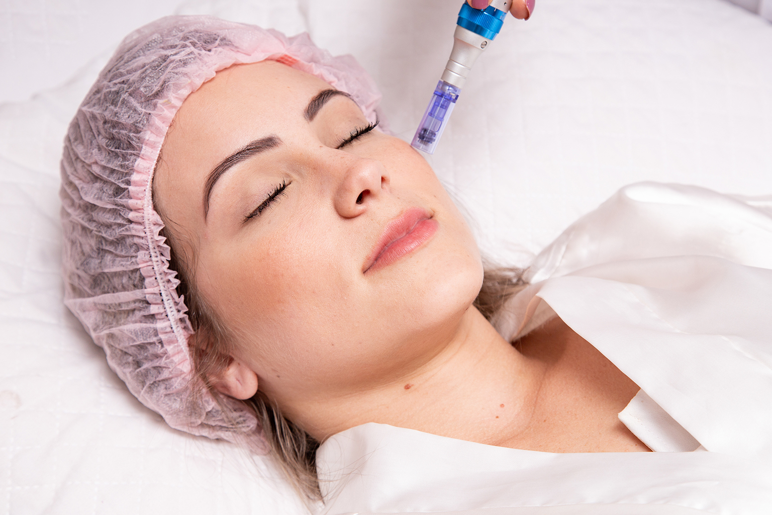 PRP vampire facial procedure being performed on a woman to improve skin elasticity and tone