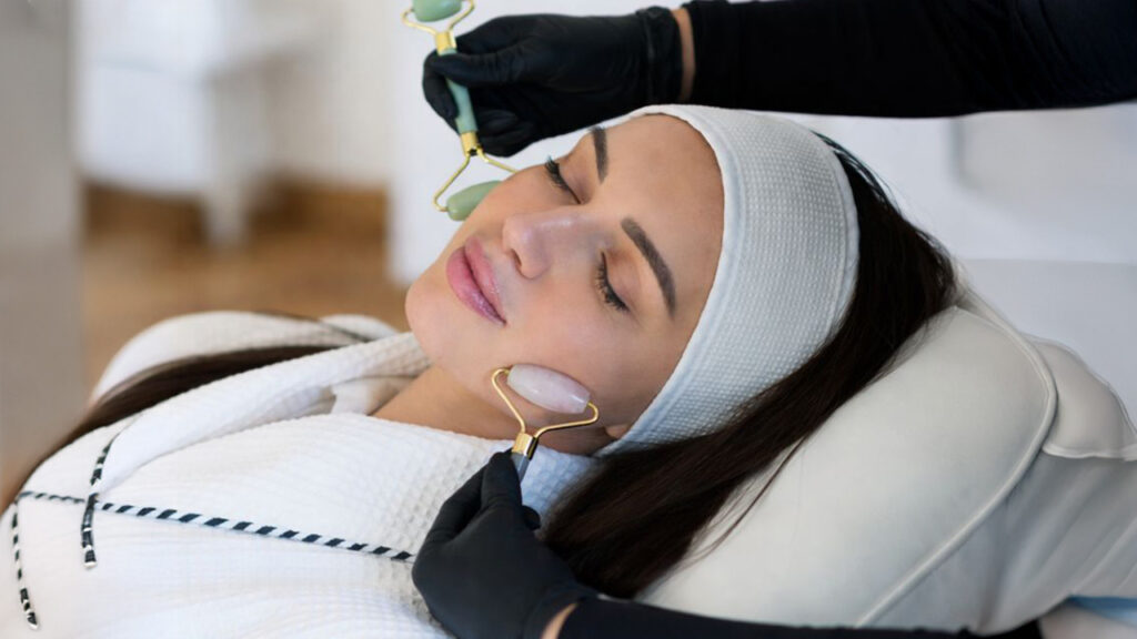 Facial pre-care with rollers before hydrafacial treatment